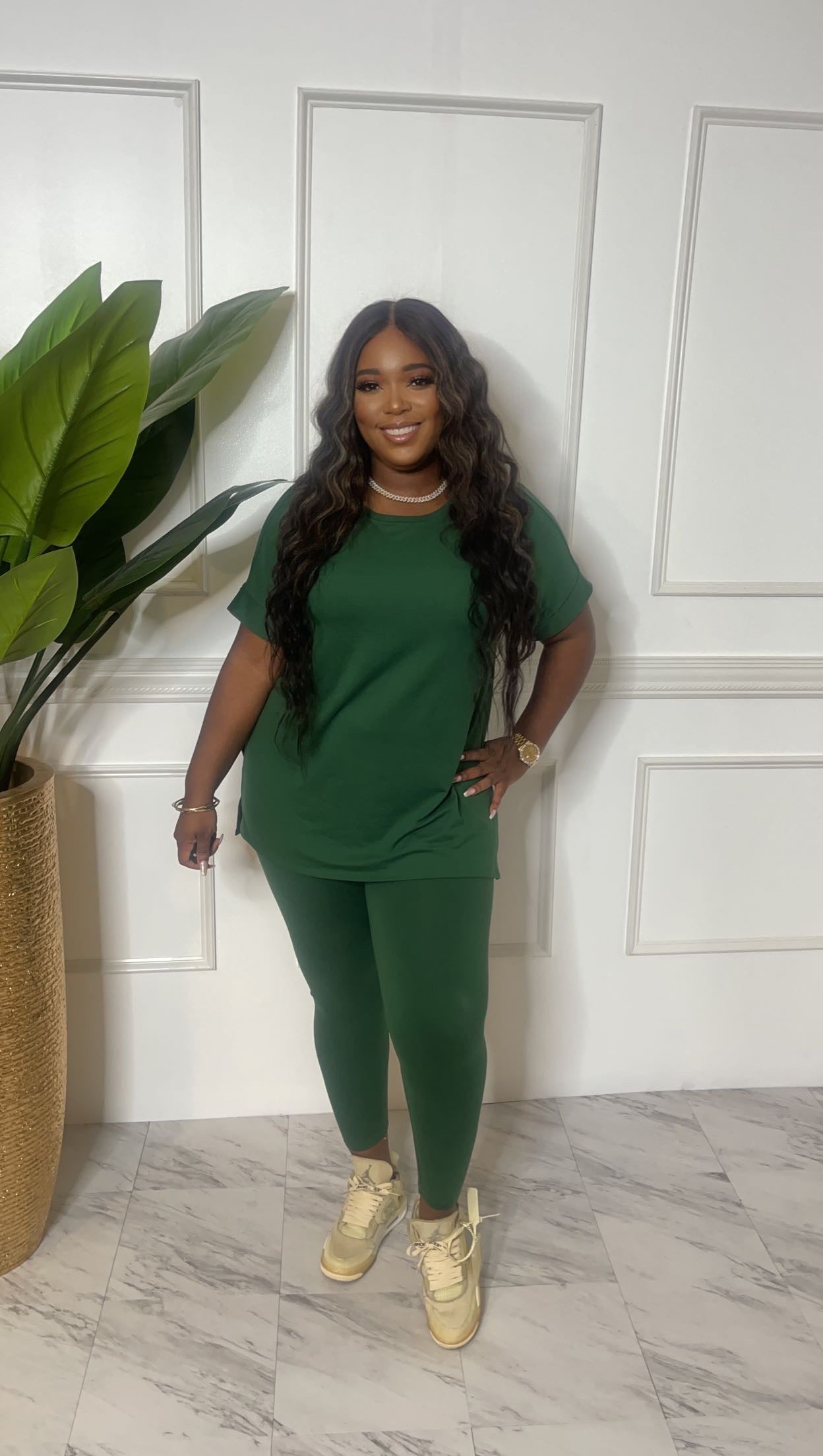 hunter green liose fitting shirt with matching leggings
