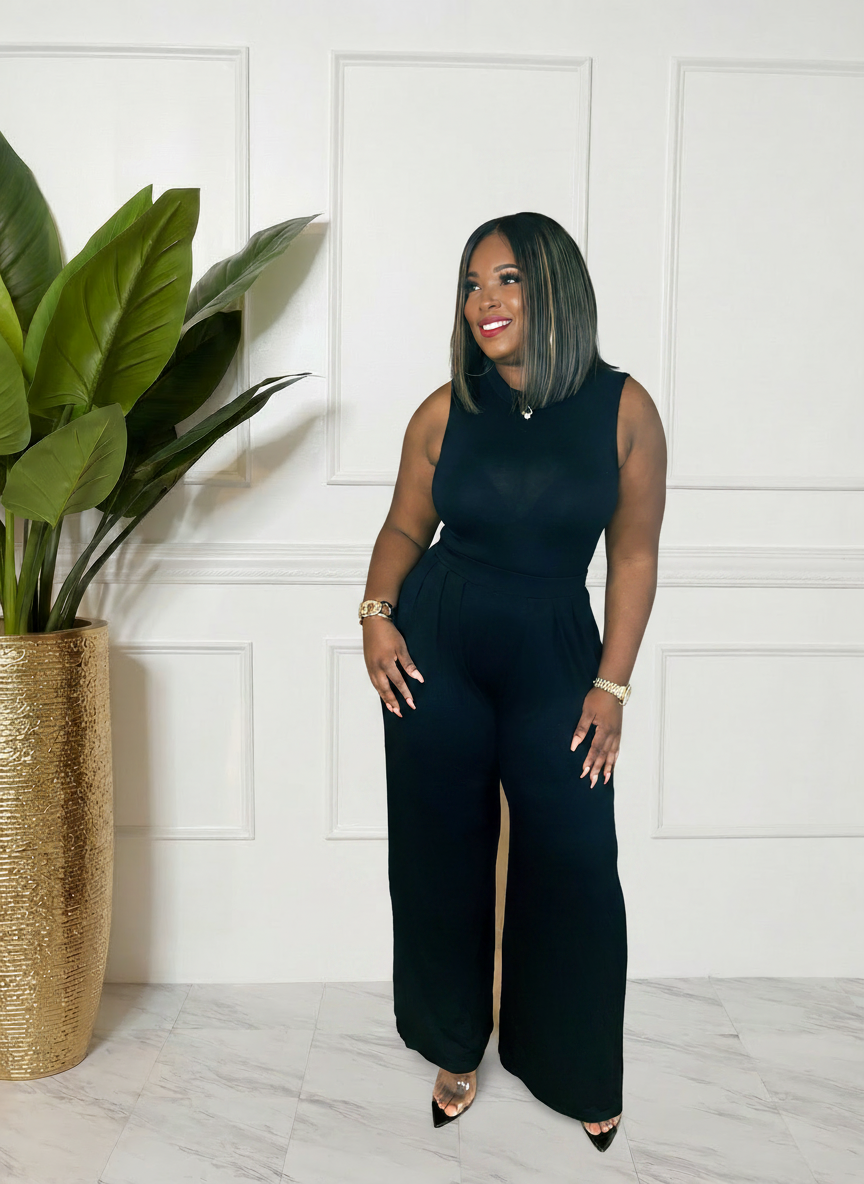She means business palazzo pants and body suit