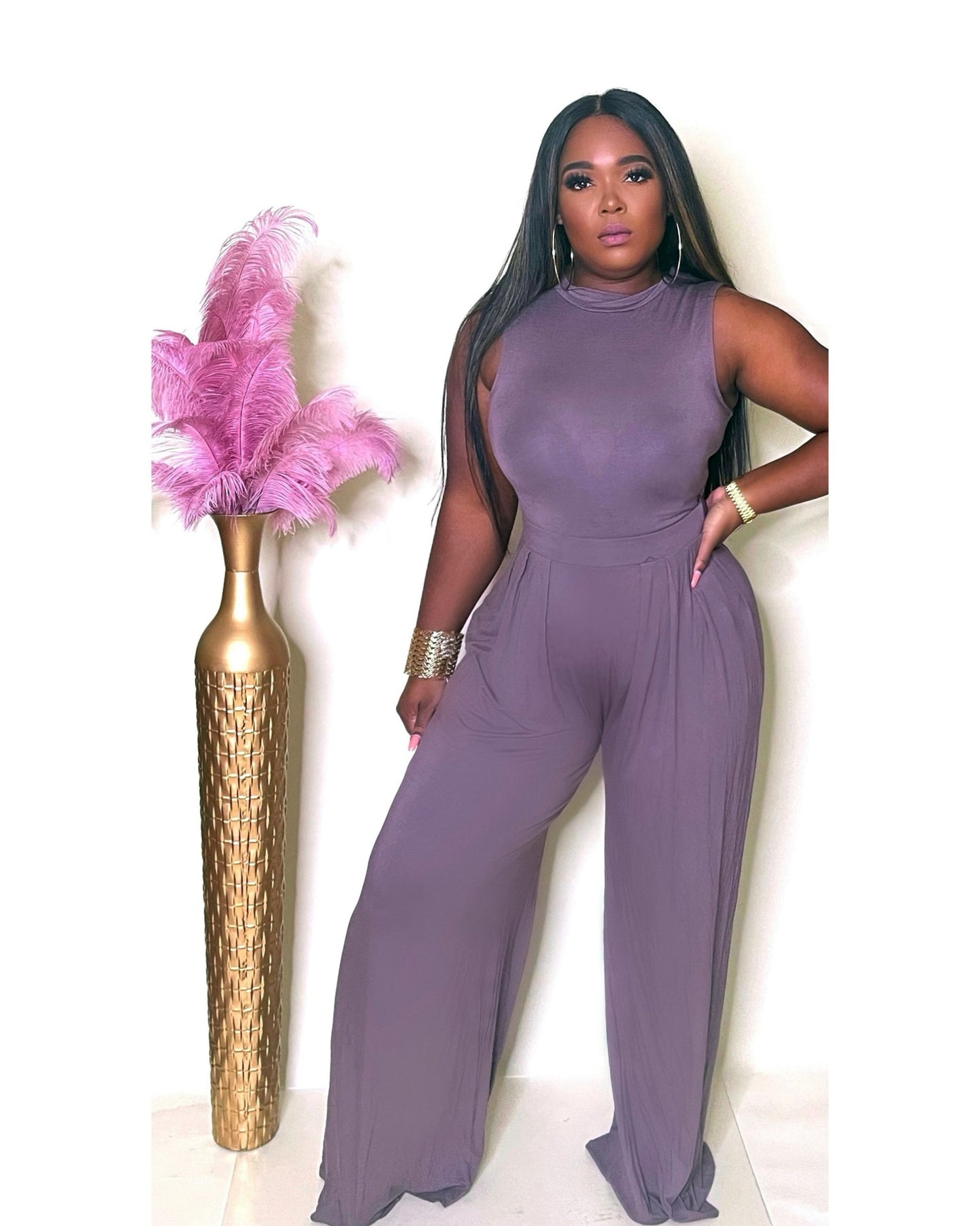 She means business palazzo pants and body suit