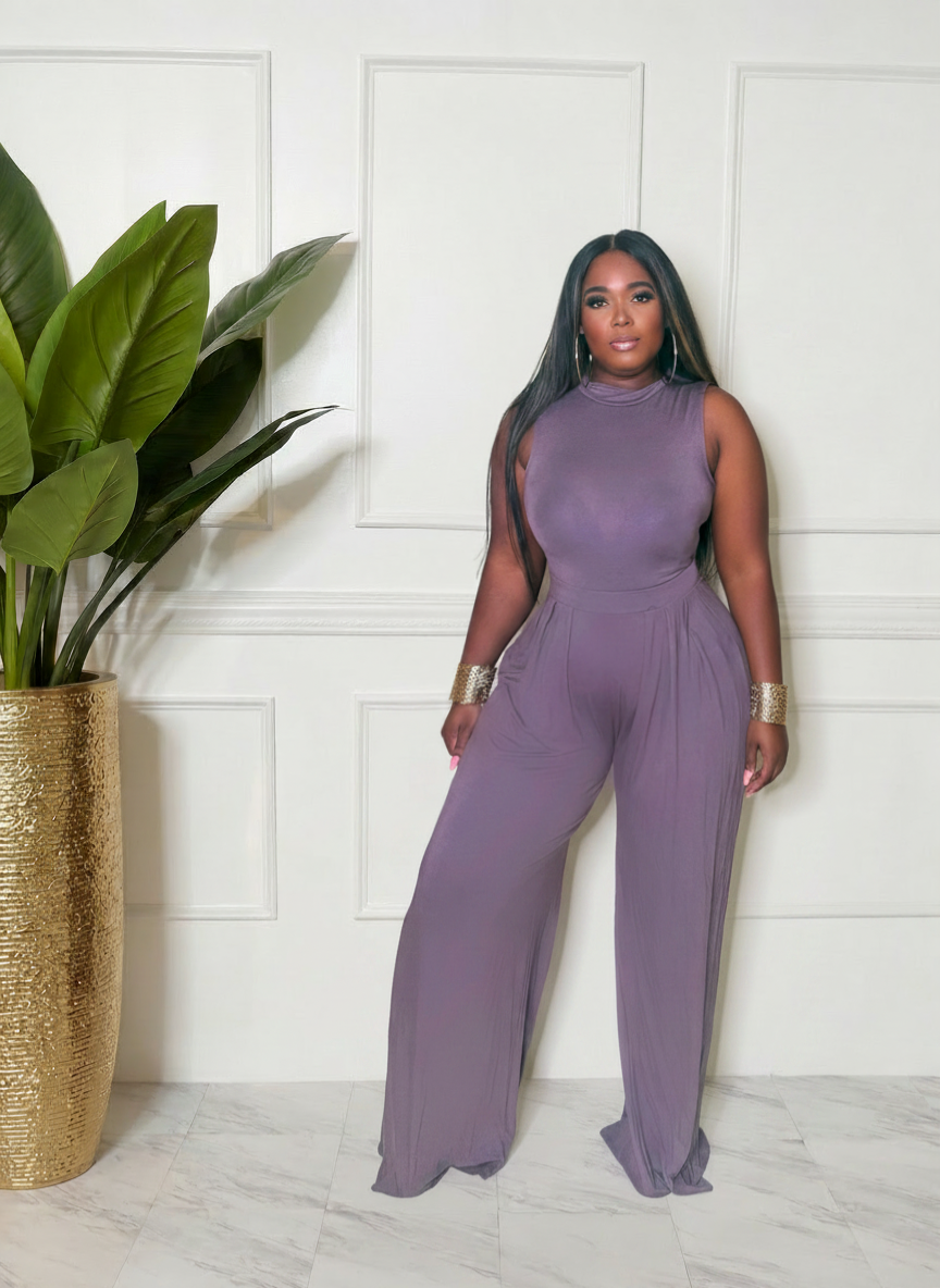 She means business palazzo pants and body suit